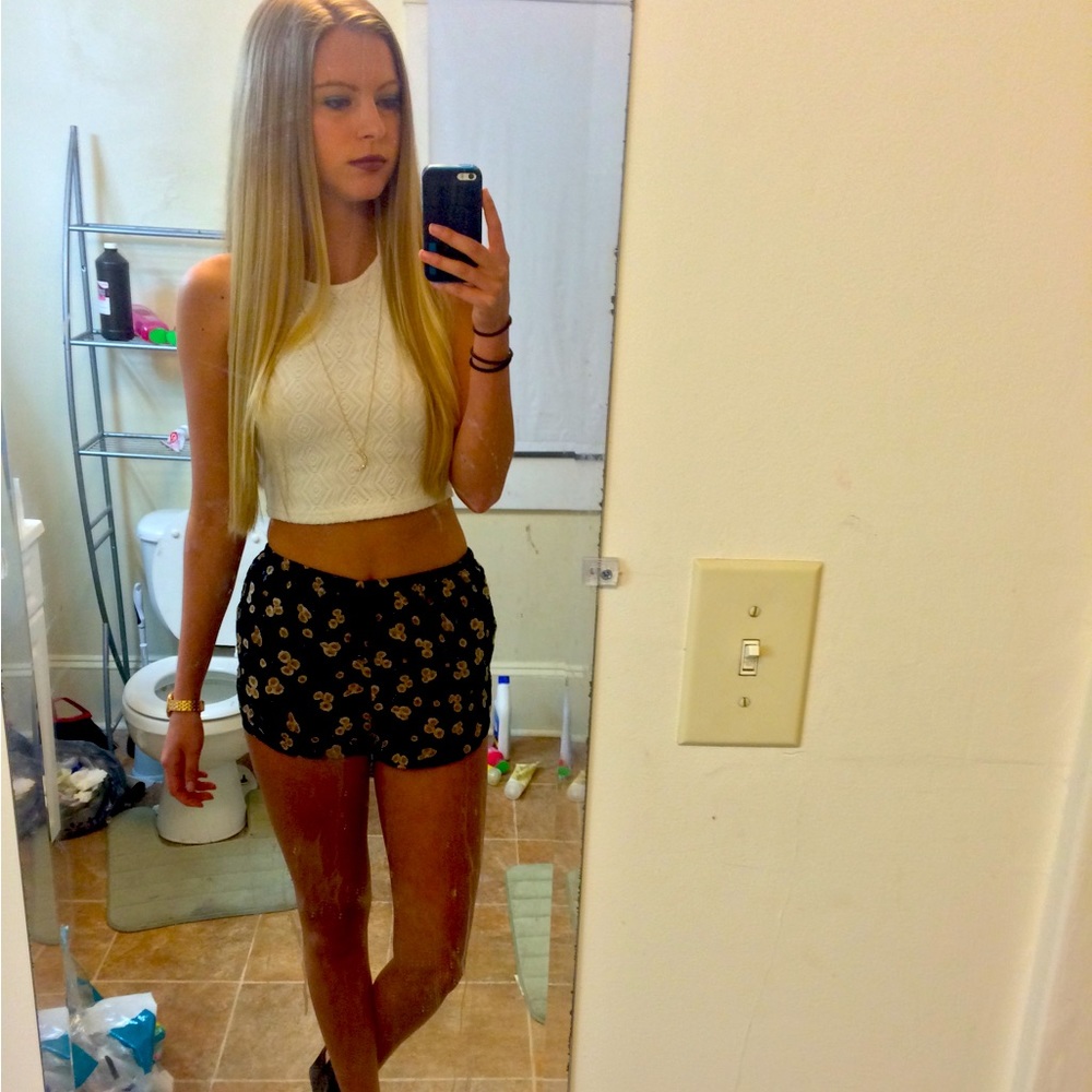 Brandy Melville black floral dolphin shorts with pockets